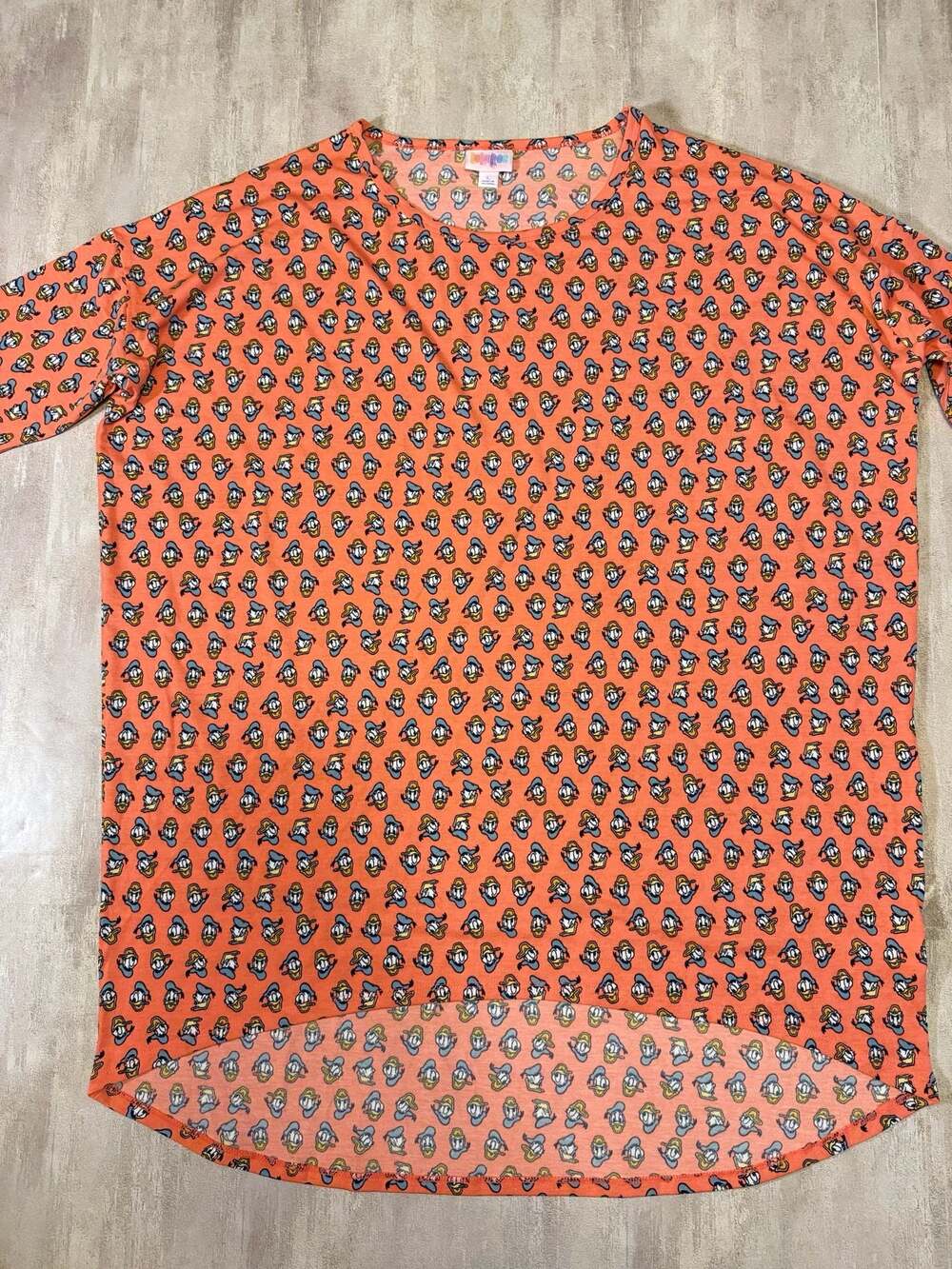 LuLaRoe Disney Donald Duck L Irma Tunic Top‎